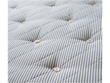 Closeup-of-teen-mattress-marine-blue-striped-tufted-fabric-made-by-NaturalMat-Huckleberry-Kids-Rooms