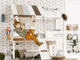 Treehouse Mid-High Loft Bed with boy swinging from rope. Huckleberry Kids Rooms